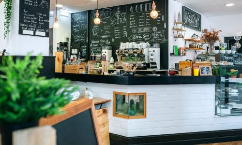 Empty cafe interior with coffee maker